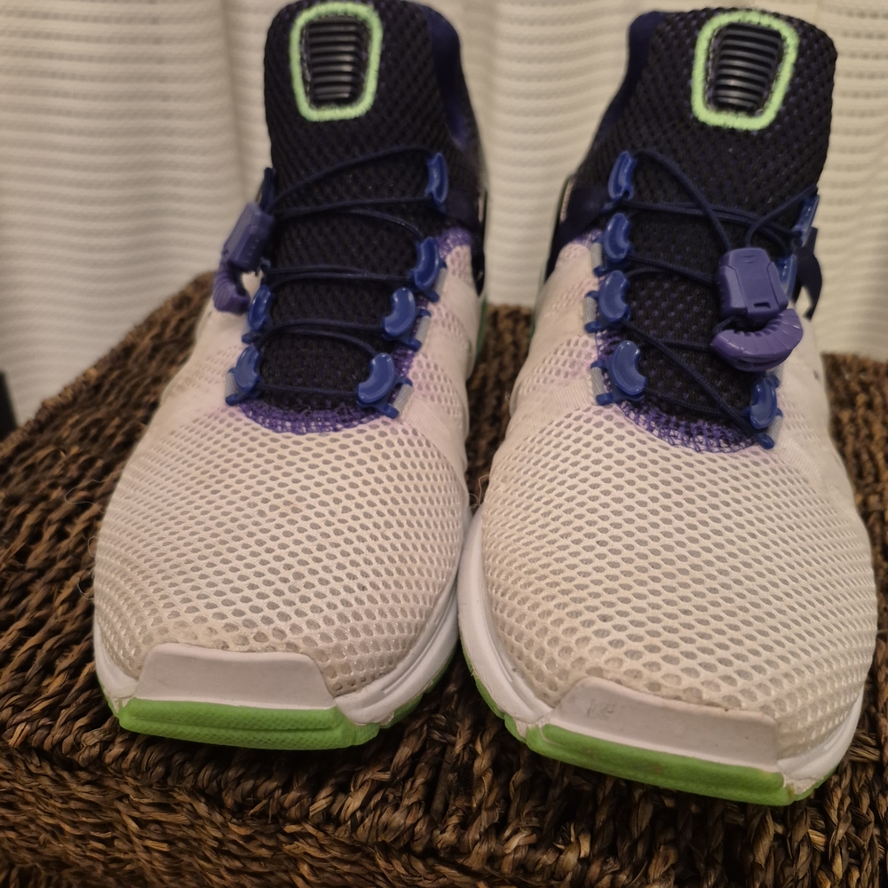 White and Purple Sneakers with Green Accents